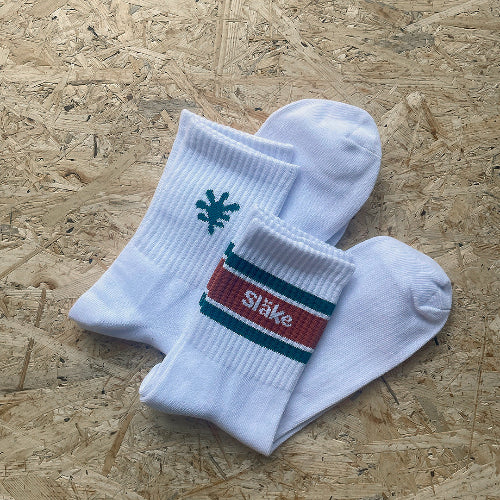 Strumpa med Släke emblem