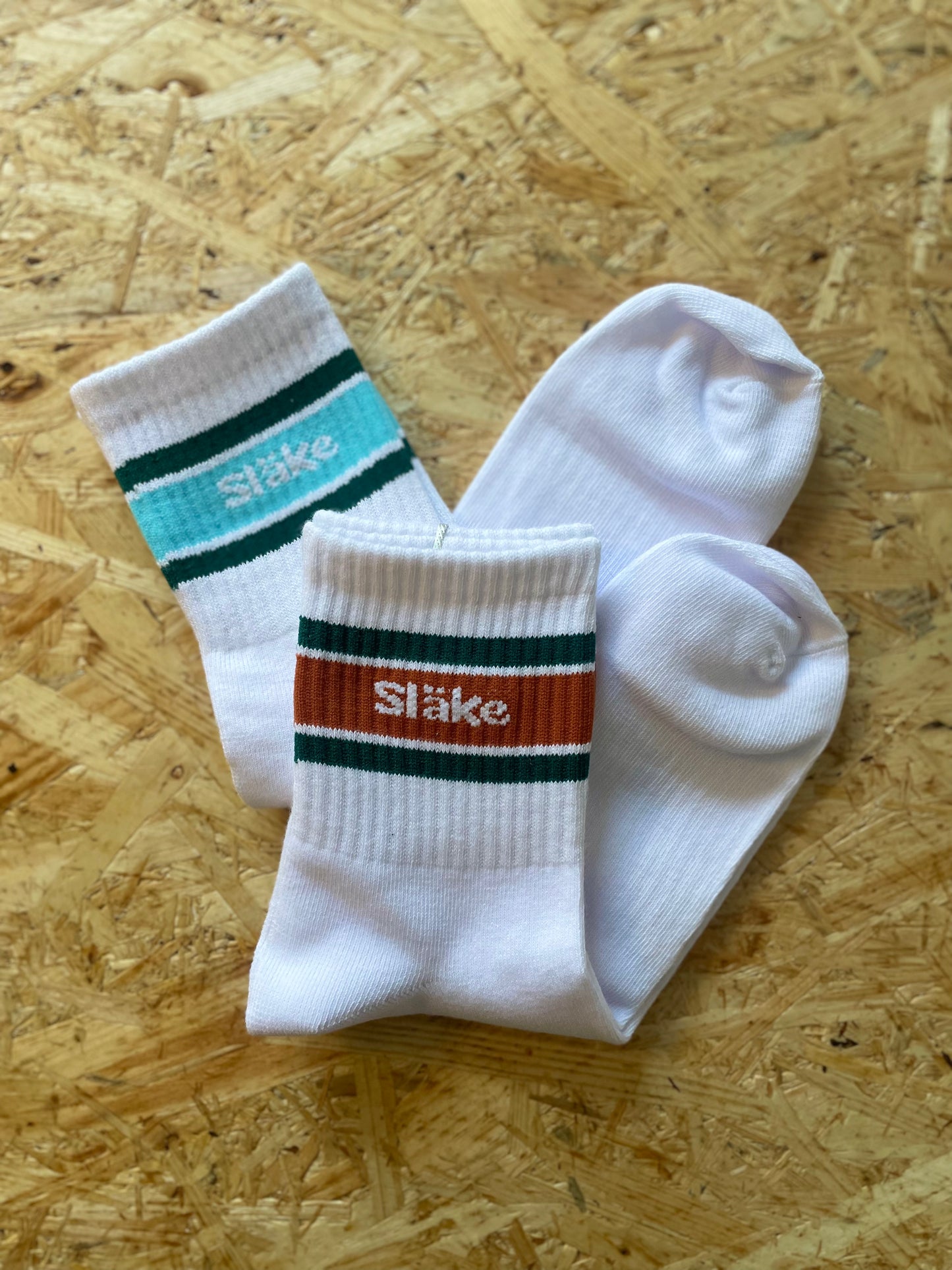 Strumpa - Släke randig orange - grön