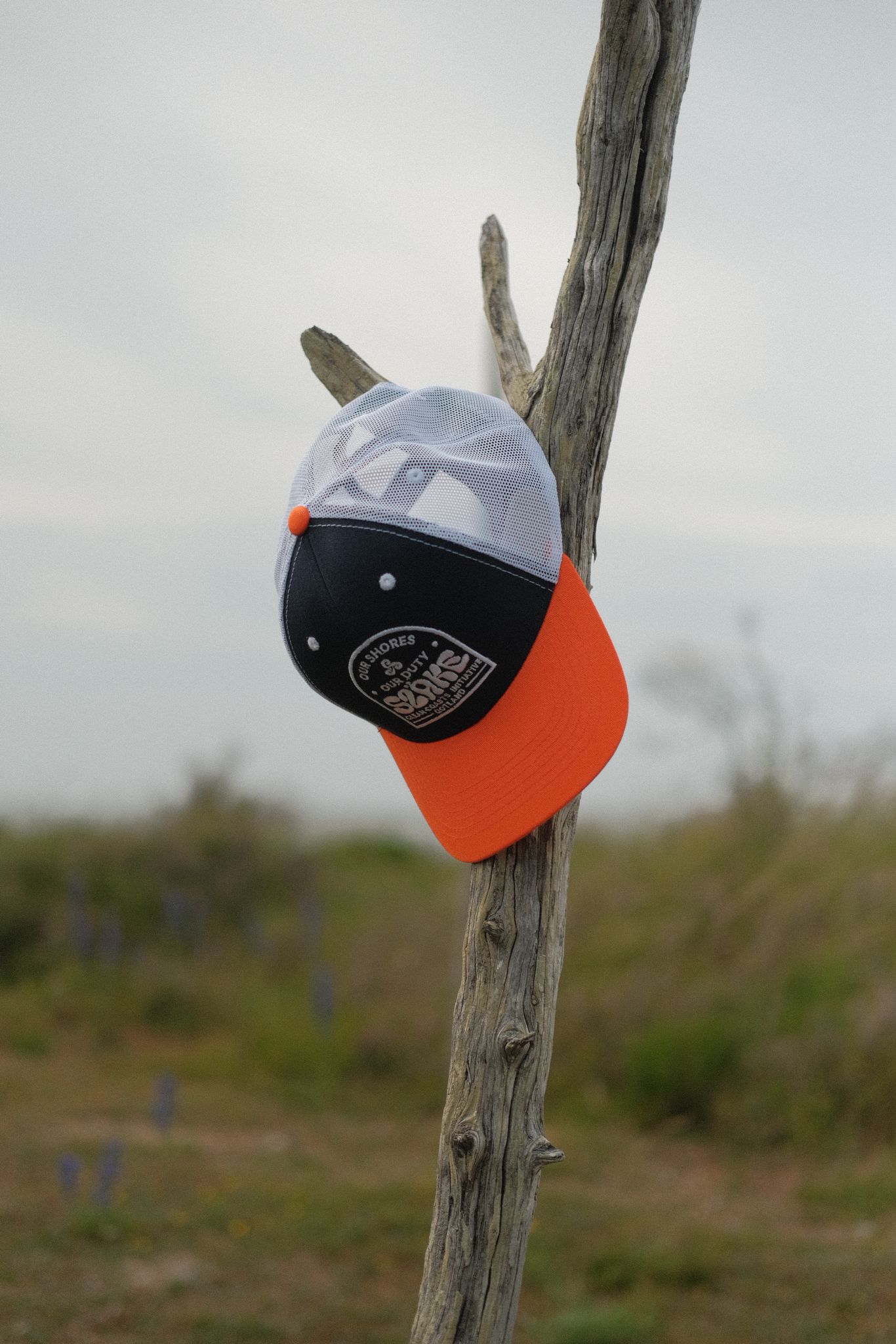 Truckerkeps- Marin blå och orange